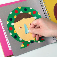 Children's book with a colorful illustration of a face and a hand interacting with it.